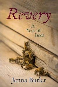 The cover for Jenna Butler's memoir, Revery: A Year of Bees, showing a close-up shot of a group of bees burrowing into a hive build behind a wooden wall.