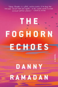 Cover art for the novel THE FOGHORN ECHOES by Danny Ramadan, featuring a setting sun on the horizon casting a seascape into pinks and blues.